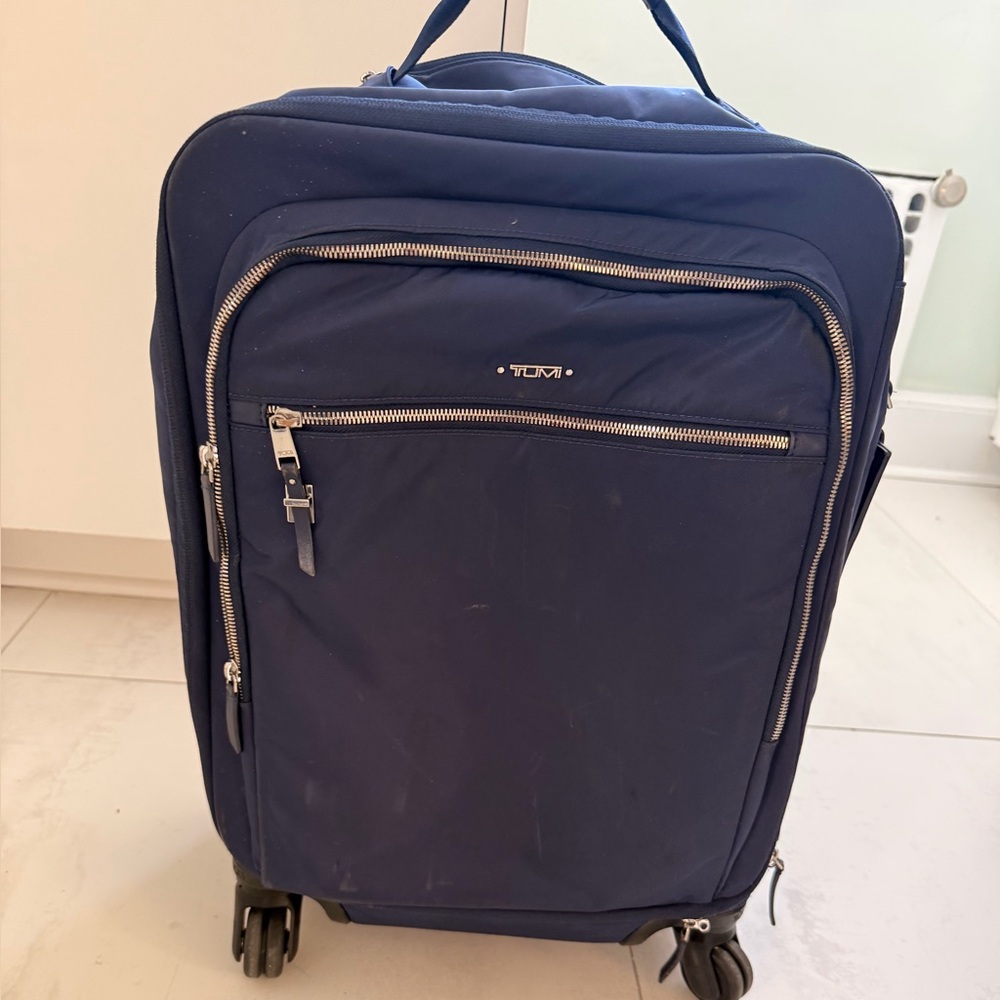 Tumi Dark Blue Carry On Luggage
